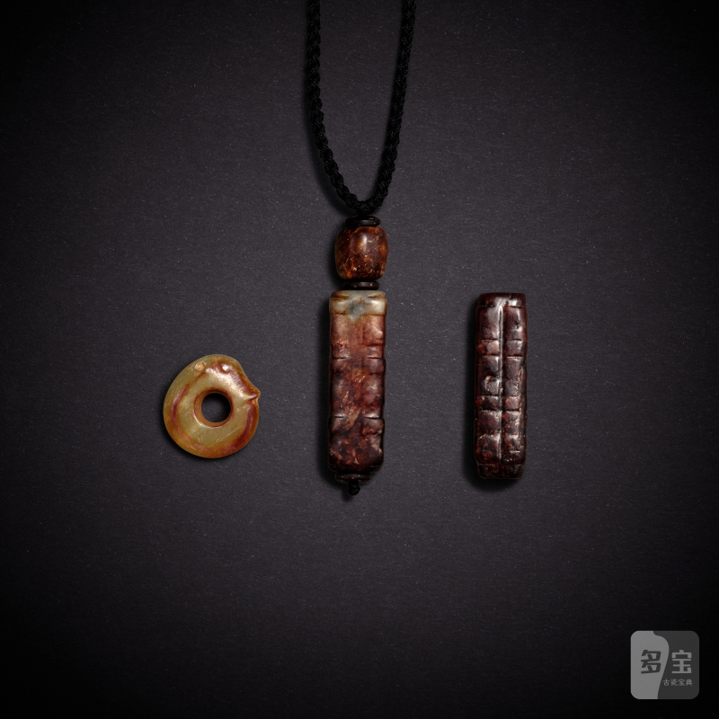 Two jade congs and a jade 'dragon' ring, Ming dynasty or earlier | 明或更早 玉琮兩件及玉龍形環一件